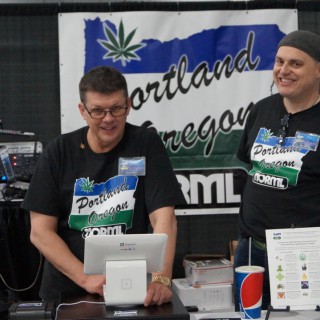 Treasurer Randy Quast and Director Russ Belville in new Portland NORML T-Shirts